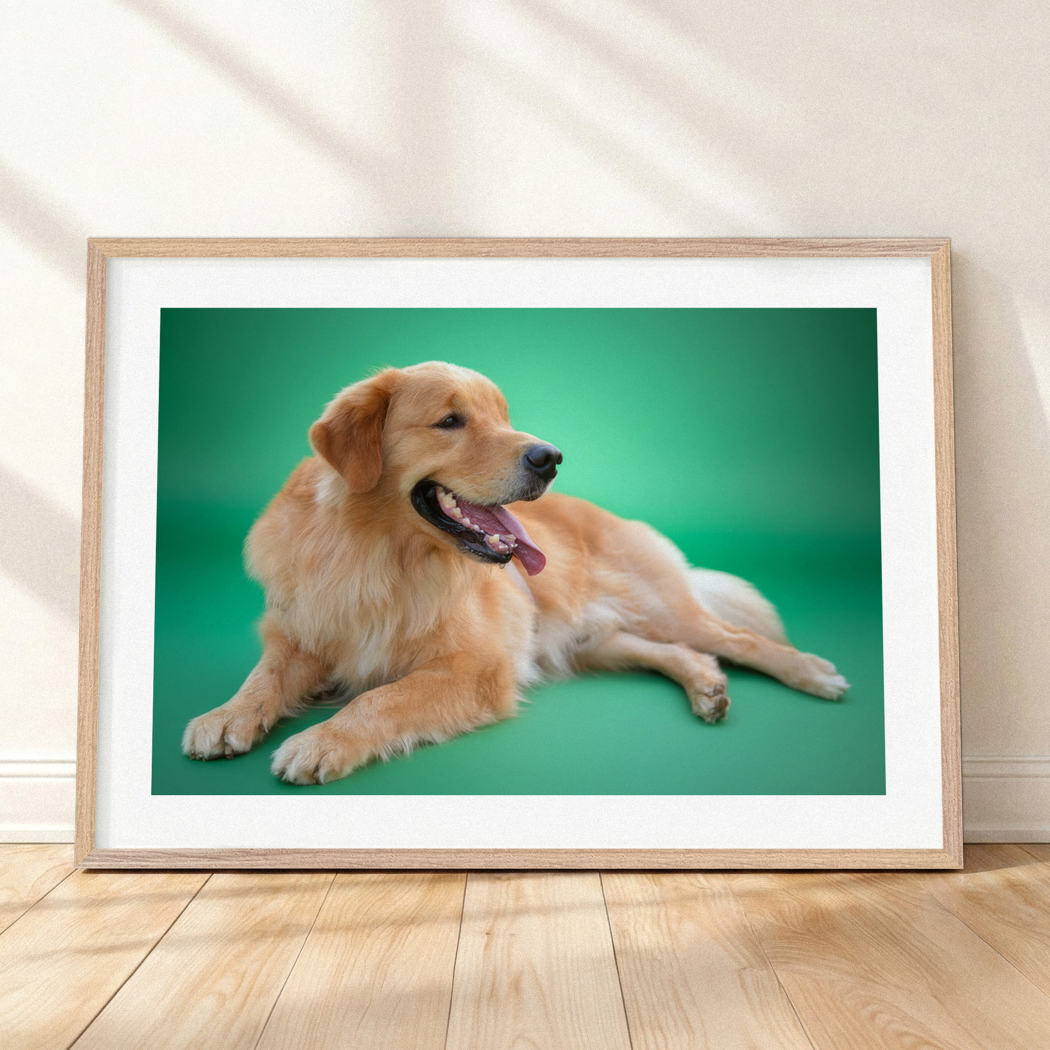 Framed mockup of The Statement Gallery — Jade by YOUNI.ONE. A bespoke horizontal pet portrait set against a refined Jade studio backdrop, finished with a white gallery border and classic wood frame.