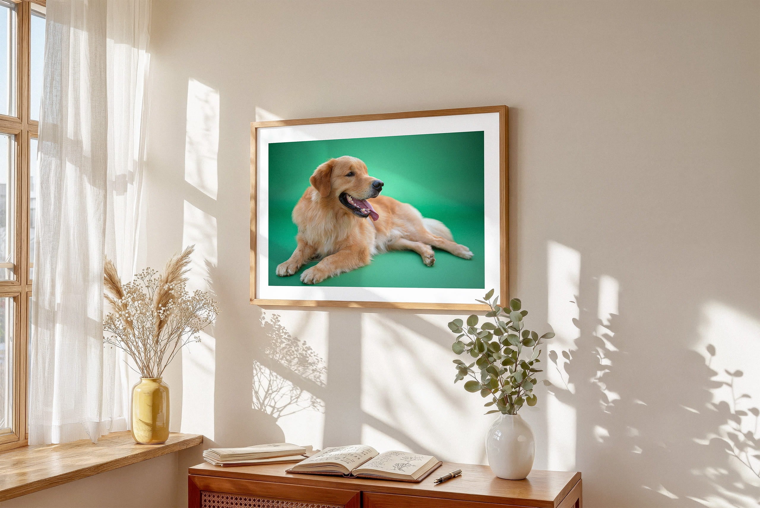 Framed lifestyle mockup of The Statement Gallery — Jade by YOUNI.ONE. A bespoke horizontal dog portrait set against a refined Jade studio backdrop, displayed as gallery-style wall art in a warm modern interior.