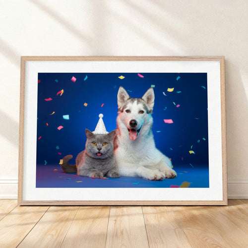 Close-up detail of "The Birthday Gallery - Studio Blue" by YOUNI.ONE. A custom bespoke horizontal pet portrait featuring two pets, a dog and a cat wearing birthday hats, showcased in a classic wood frame. Gallery-quality pet art.
